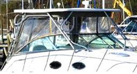 Photo of Wellcraft Coastal 270, 2001: Hard-Top, Front Connector, Side Curtains, Aft-Drop-Curtain, viewed from Starboard Front 