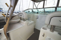 Photo of Wellcraft Coastal 270, 2002: Hard-Top, Front Connector, Side Curtains, viewed from Starboard, Inside 