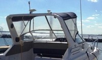 Photo of Wellcraft Martinique 2800, 1998: Bimini Top, Front Connector, Side Curtains, viewed from Starboard Rear 