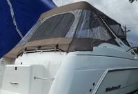 Photo of Wellcraft Martinique 3000, 2001: Bimini Top, Front Connector, Side Curtains, Arch Aft Curtain, viewed from Starboard Rear 