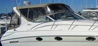 Photo of Wellcraft Martinique 3300, 2000: Bimini Top, Front Connector, Side Curtains, Arch Aft Curtain, viewed from Starboard Front 