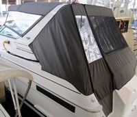 Photo of Wellcraft Martinique 3600, 1998: Bimini Top, Connector, Side Curtains, Arch Aft Curtain, viewed from Port Rear 